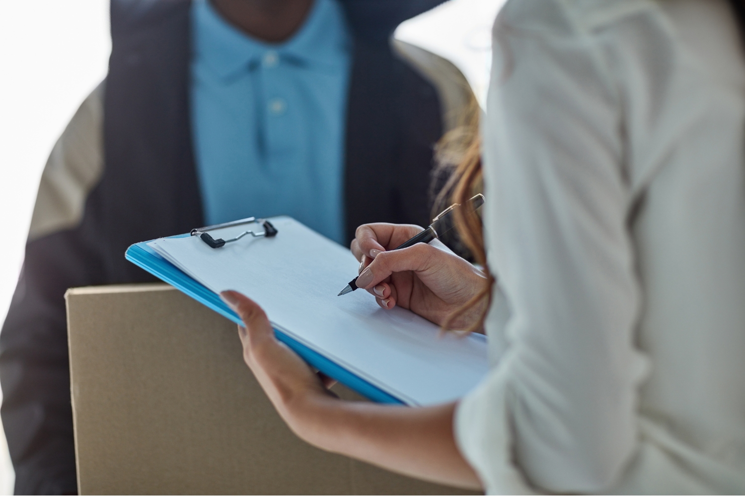 business owner checking compliance for commercial heating unit